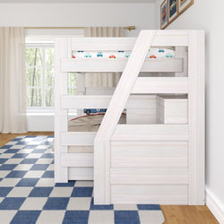 White wooden kids bunk bed with angled staircase and built-in storage, car-print bedding, blue checkered rug and large window in bright children's bedroom