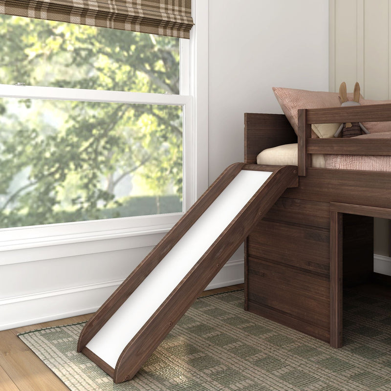 Kids wooden loft bed with slide beside a sunlit window and plaid Roman shade, blush pillows and rabbit plush in a modern children's bedroom