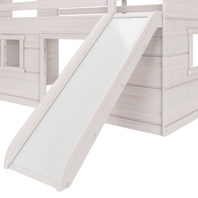 White wooden slide attached to a whitewashed loft playhouse bunk bed for kids, smooth panel slide designed for children's bedroom or playroom