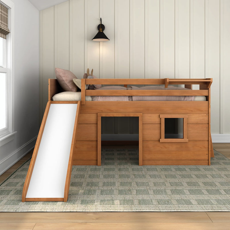 Wooden children's loft bed with slide and lower playhouse, neutral nursery with vertical shiplap wall and black wall sconce