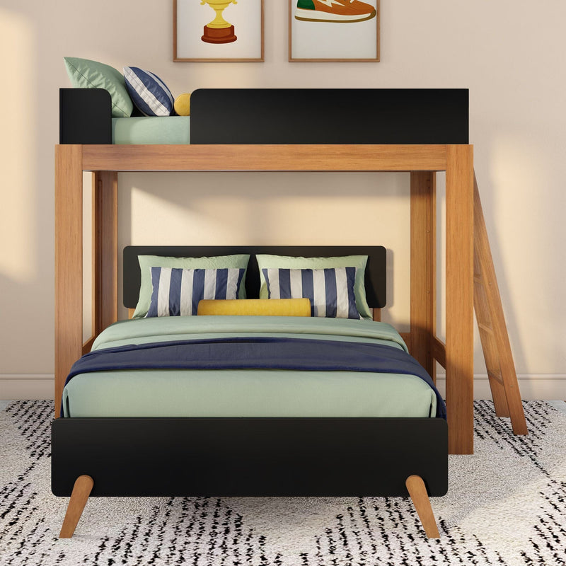 Modern wooden bunk bed with black safety panels, mint and navy bedding, striped pillows, yellow bolster and ladder in a cozy kids' bedroom