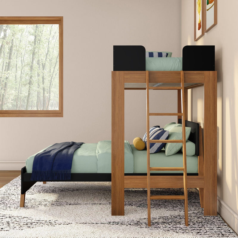 Wooden twin loft bunk bed with ladder, mint green bedding, navy throw and striped pillows in a modern kids' bedroom by a large window with forest view