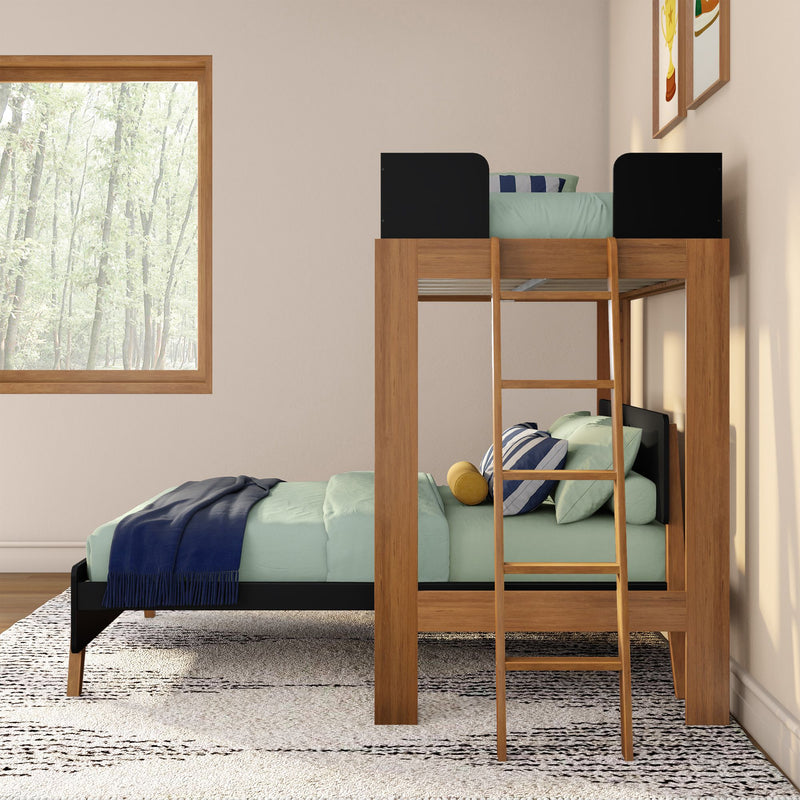 Wooden loft bunk bed with ladder, mint-green bedding and navy throw in modern kids' bedroom with large window and forest view