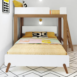 Stylish modern wooden bunk bed with plush bedding in a cozy bedroom setup.