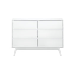 Modern white dresser with six drawers for bedroom storage.