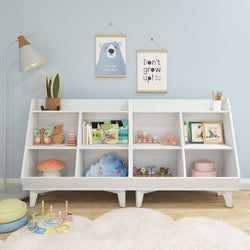 Kids' playroom with white bookshelf, colorful toys, and children's books.