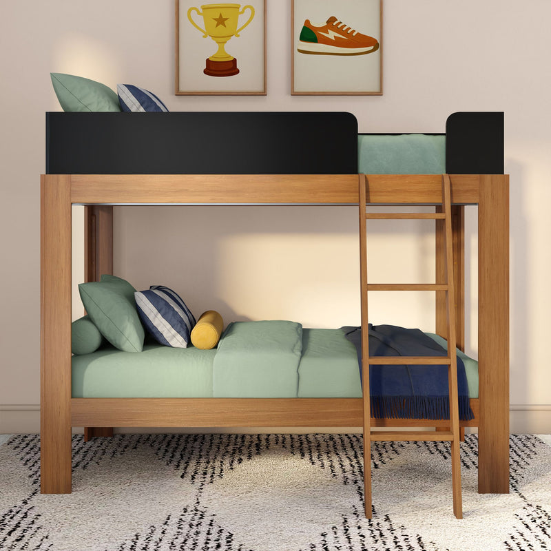 Modern wooden bunk bed with ladder, black guardrail, mint green bedding, decorative pillows and yellow bolster, framed trophy and sneaker wall art — space-saving kids bedroom loft bed