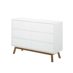 Modern white dresser with six drawers and wooden legs.