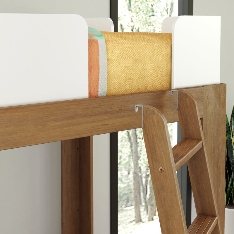 Wooden bunk bed ladder and railing with white guard panels, yellow herringbone blanket and colorful mattress in modern bedroom