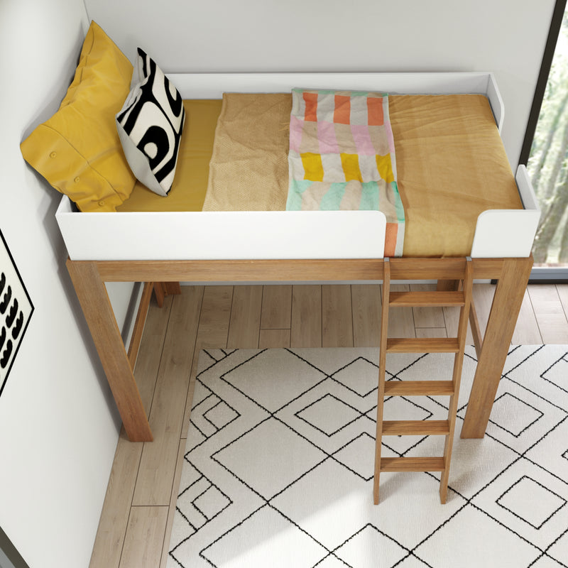 Top-down view of a modern wooden loft bed with ladder and white guardrail, yellow pillow, black-and-white cushion, colorful throw and geometric rug