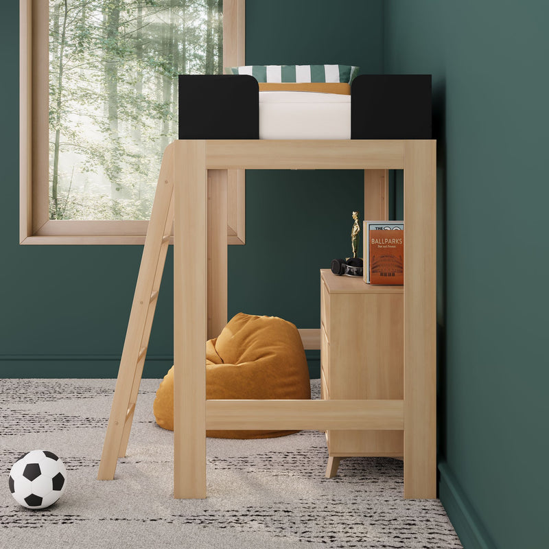 Wooden loft bed in children's bedroom with green wall and forest window, striped pillow, mustard beanbag and soccer ball