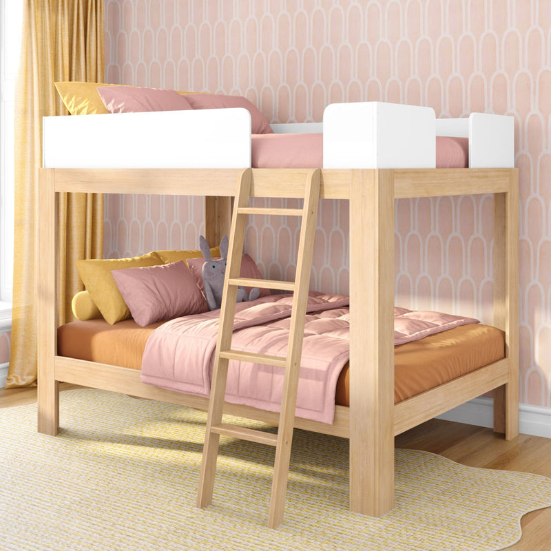 Wooden loft bunk bed with ladder in pastel pink and yellow children's bedroom, patterned wallpaper and plush pillows