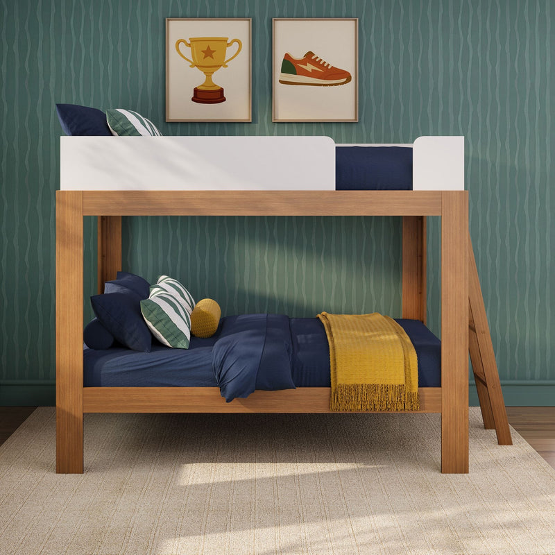 Wooden kids bunk bed with navy bedding, green striped pillows, mustard throw, teal wallpaper and framed trophy and sneaker prints