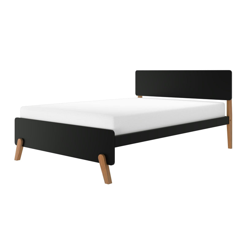 Mid-century modern black low-profile platform bed frame with angled oak legs and white mattress on white background