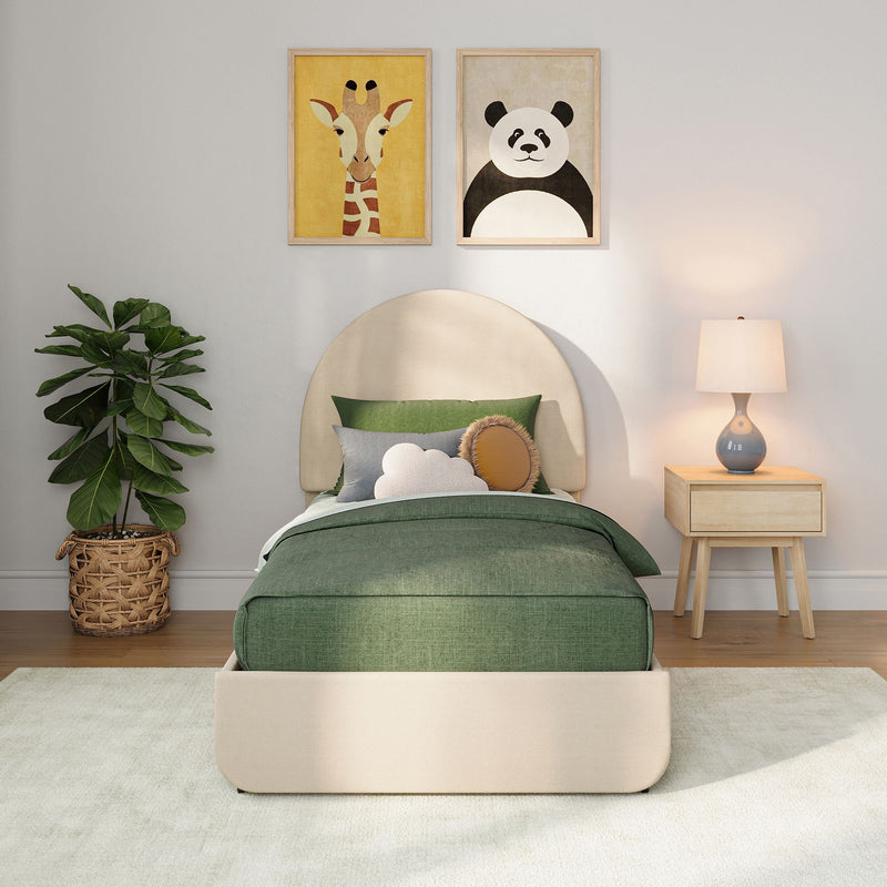 Children's bedroom with green bedding and rounded beige headboard, giraffe and panda framed animal wall art, wooden nightstand lamp and potted fiddle‑leaf fig — modern nursery decor