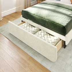 Under-bed storage drawer with neatly organized bedding in a modern bedroom setting.