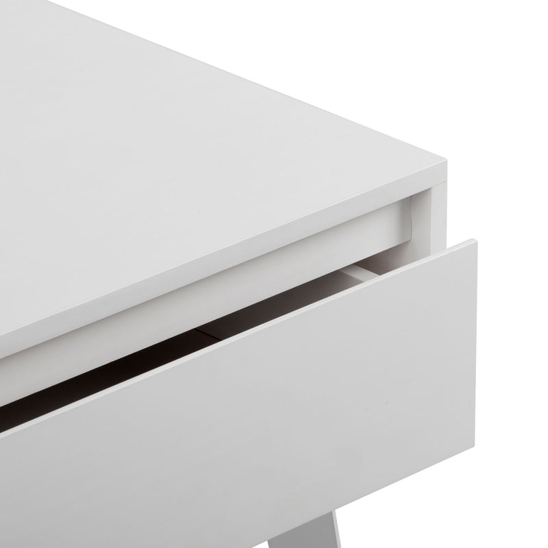 Close-up of a white modern nightstand with a partially open drawer, minimalist bedside table storage with smooth matte finish