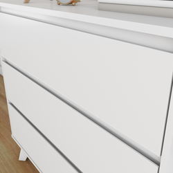 Close-up of modern white three-drawer dresser with recessed handles on hardwood floor, minimalist bedroom furniture
