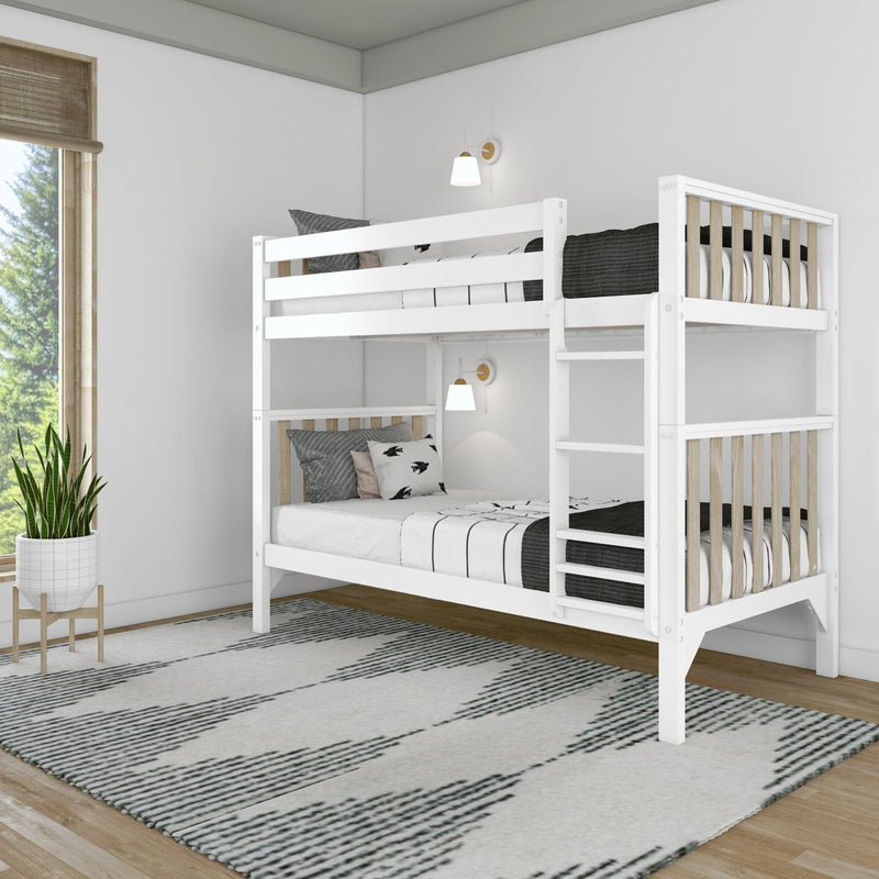 White wooden twin-over-twin bunk bed with ladder and natural wood slats in a modern minimalist bedroom, featuring neutral black-and-white bedding, wall sconces, area rug and potted plant