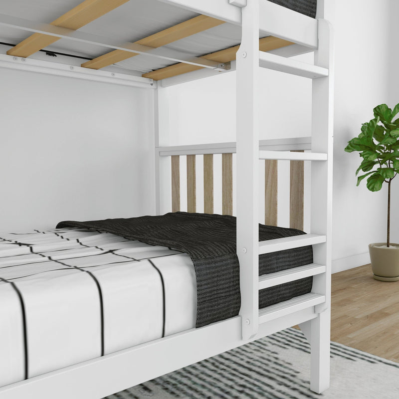 White wooden twin-over-twin bunk bed with striped sheets and black knit blanket, light wood slats and potted plant in modern bedroom