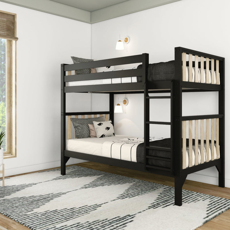 Modern black wooden bunk bed with natural wood slats, ladder and striped bedding in a bright minimalist kids' bedroom with wall sconces