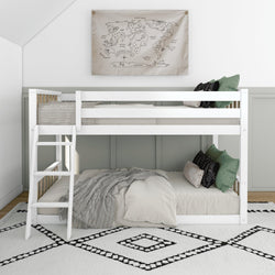 White bunk bed in modern children's bedroom with stylish decor and cozy bedding.