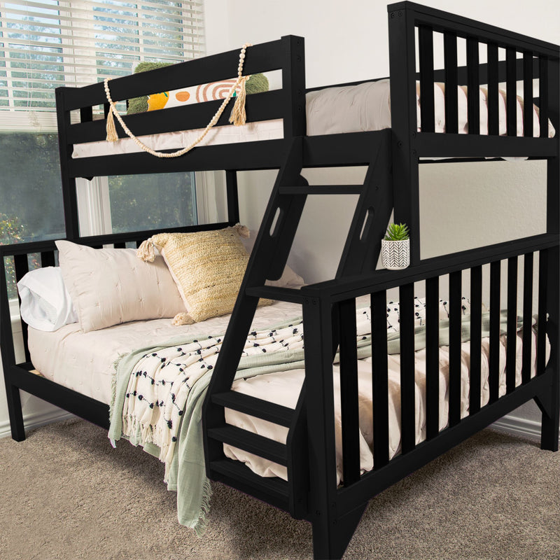 Black wooden loft bunk bed with ladder, beige bedding and woven pillows, decorative bead garland and small potted succulent on railing in a bright carpeted kids' bedroom
