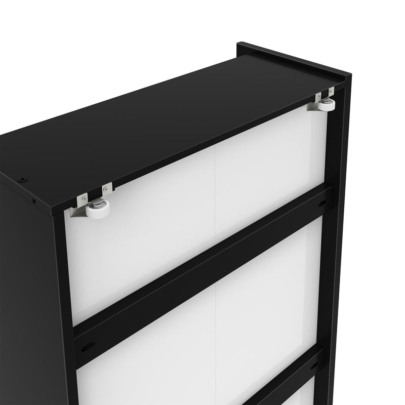 Close-up of black sliding door frame with white panel inserts and top roller hardware, modern interior door track detail