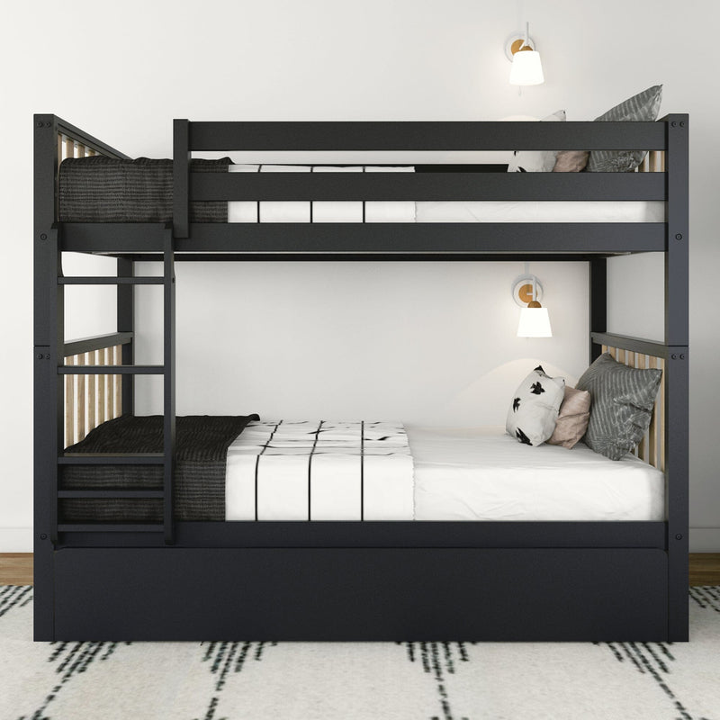 Black metal twin-over-full bunk bed with ladder and safety rails, white grid bedding and decorative pillows, wall sconces in a modern minimalist bedroom