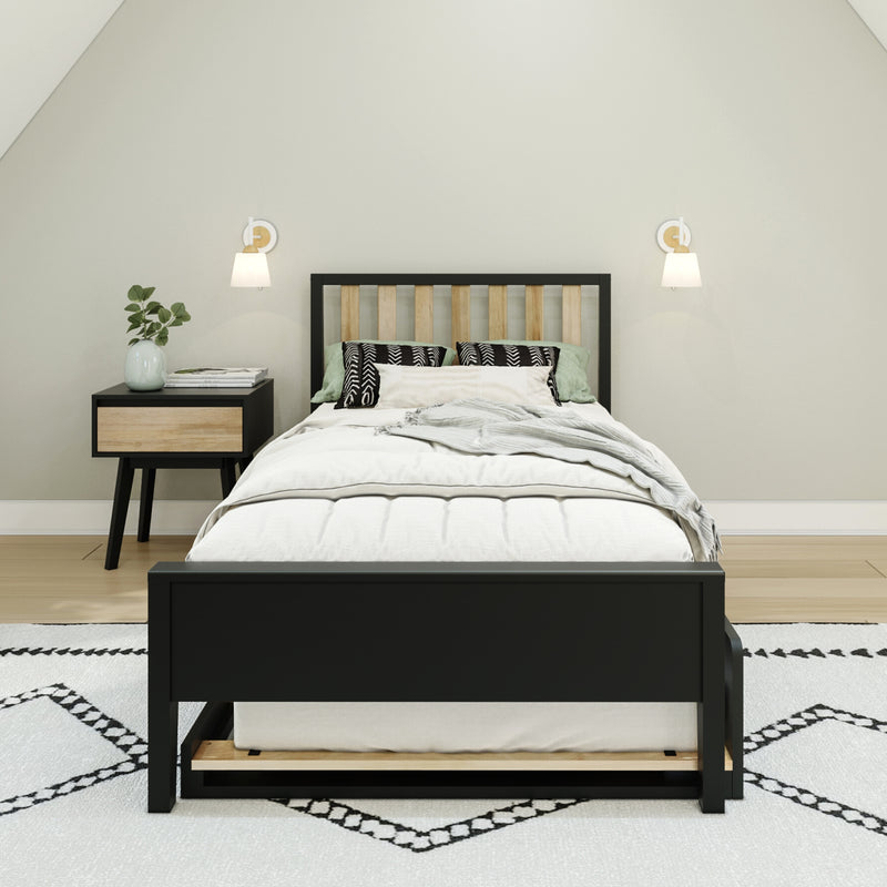 Modern minimalist bedroom with black wood bed frame and light slat headboard, neutral bedding, patterned pillows, bedside vase and wall sconces
