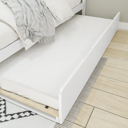 Trundle bed with white mattress and wooden floor in a modern bedroom setting.