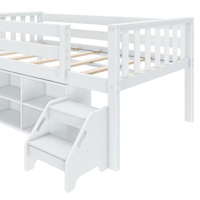 White kids loft bed with built-in storage cubbies and staircase drawers, slatted wooden mattress support and safety guardrails
