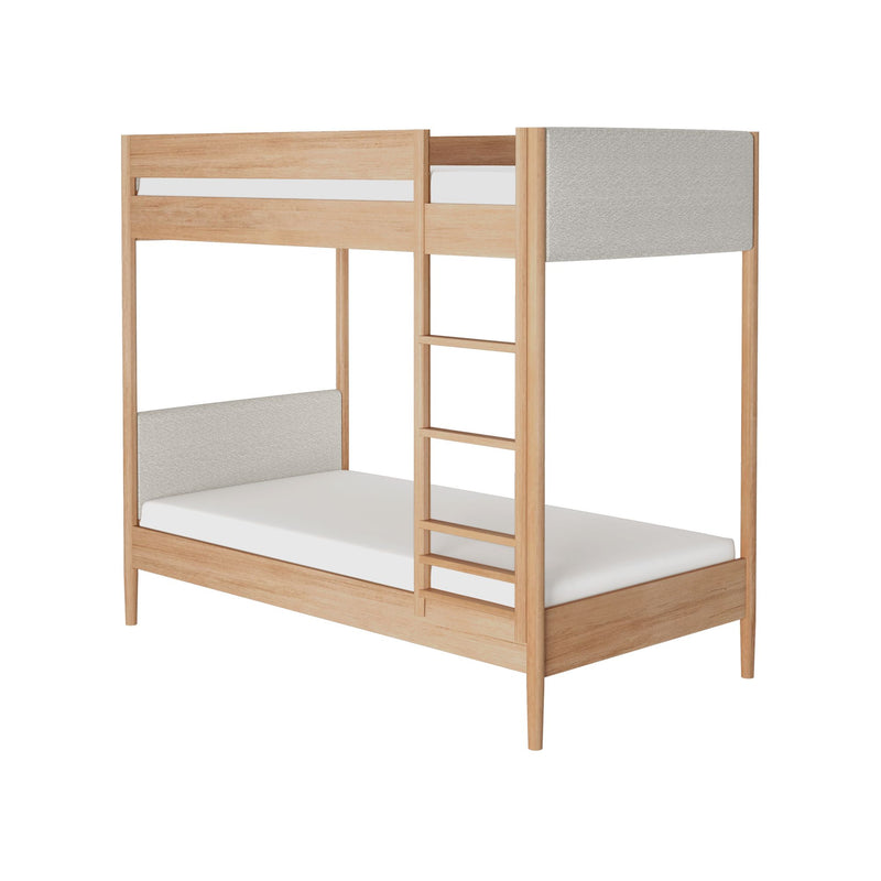 Minimalist natural wood twin-over-twin bunk bed with built-in ladder, light gray fabric head and foot panels, and solid wood frame for kids' bedroom