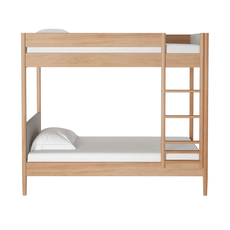 Modern natural oak wooden bunk bed with built-in ladder, twin-over-twin space-saving design, white mattresses and pillows, minimalist bedroom furniture