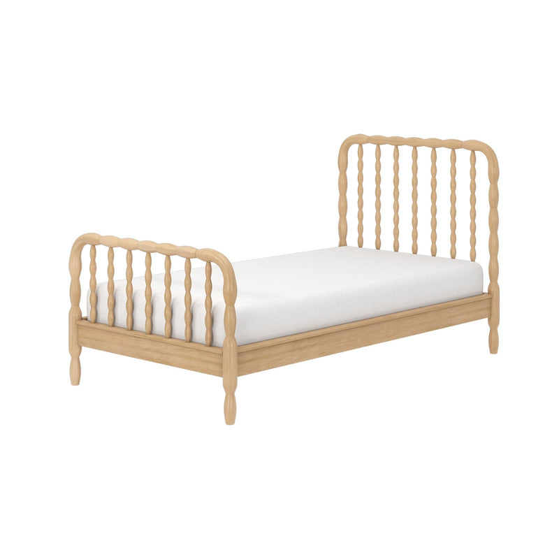 Light natural wood spindle bed frame with curved headboard and footboard and white mattress