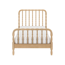 Front view of a light natural wood spindle twin bed frame with turned spindles, headboard and footboard, white mattress, modern farmhouse style