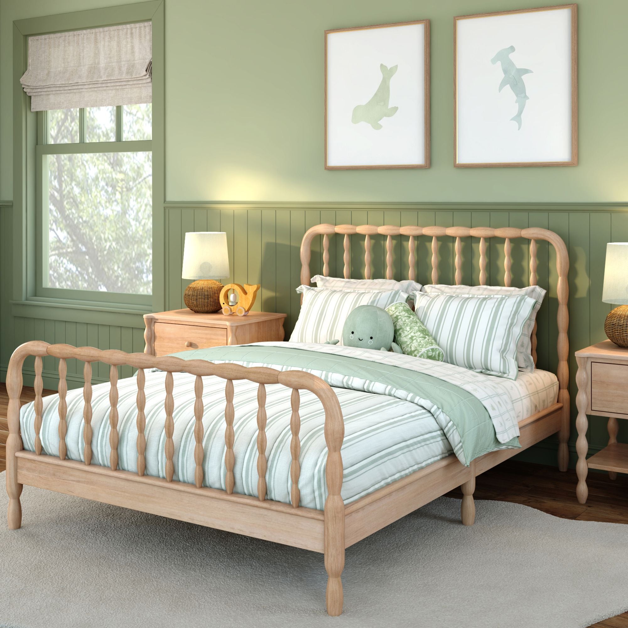 A light-wood finish Jenny Lind full bed with green and white sheets in a green room. Matching nightstands are on either side of the bed.