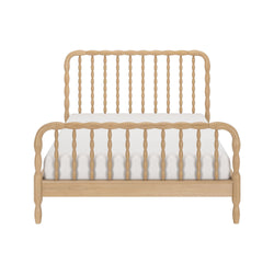 Natural light wood spindle bed frame with turned spindles, headboard and footboard, white mattress — farmhouse-style wooden bed