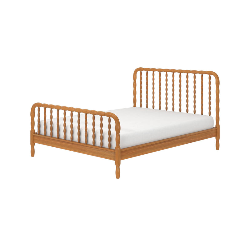 Natural oak spindle bed frame with turned posts and white mattress, solid wood headboard and footboard in modern farmhouse style