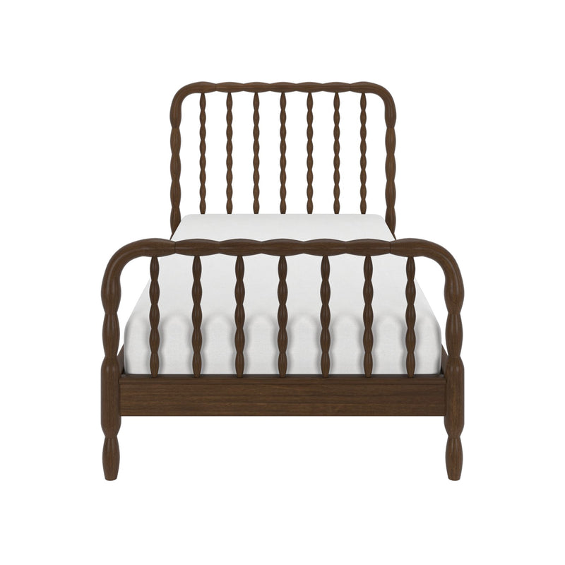 Dark wooden spindle bed frame with turned spindles, vintage farmhouse headboard and footboard paired with white mattress