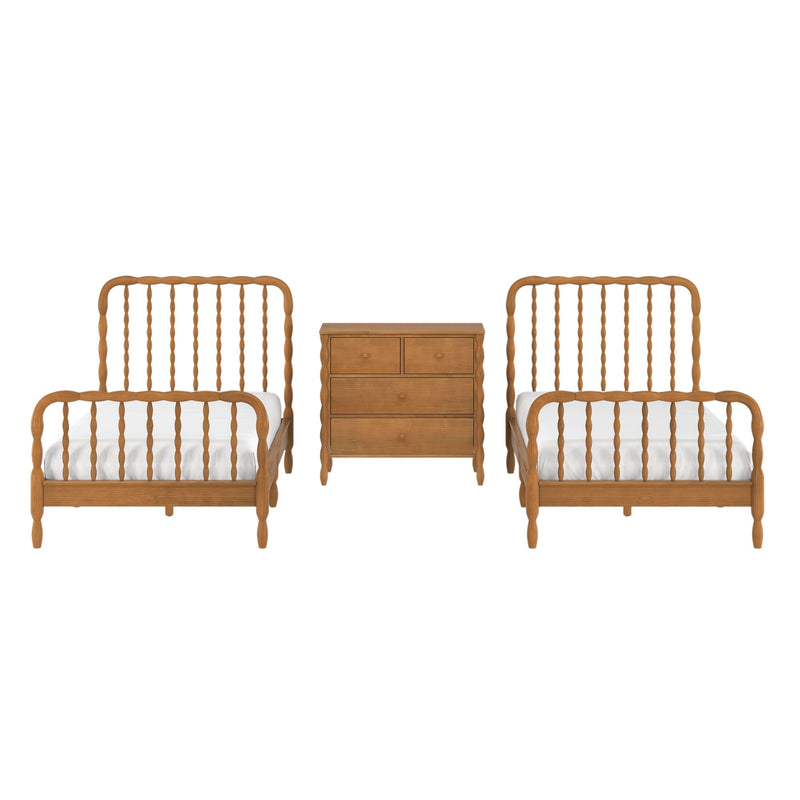 Two wooden twin beds with spindle headboards and white bedding flanking a matching wooden three-drawer nightstand on a white background
