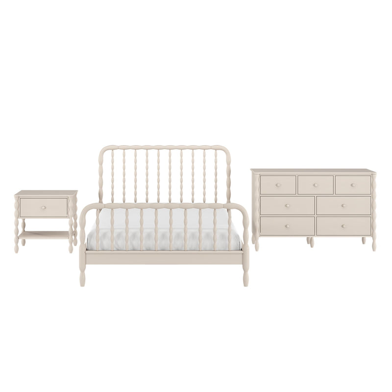 Cream wooden spindle bed frame with white bedding and matching nightstand and dresser — cottage-style bedroom furniture set