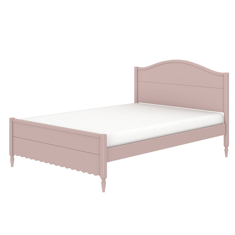 Pink wooden twin bed frame with arched headboard and scalloped footboard, white mattress — cottage-style children's bedroom furniture