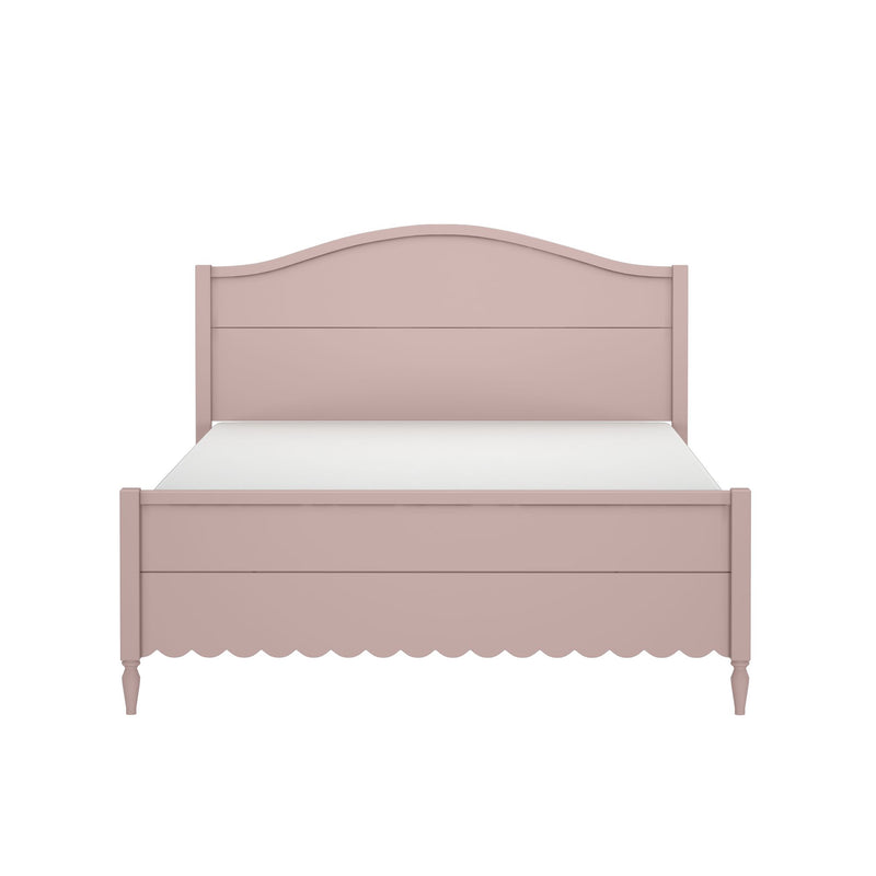 Blush pink wooden bed frame with arched headboard, scalloped skirt, turned legs and white mattress