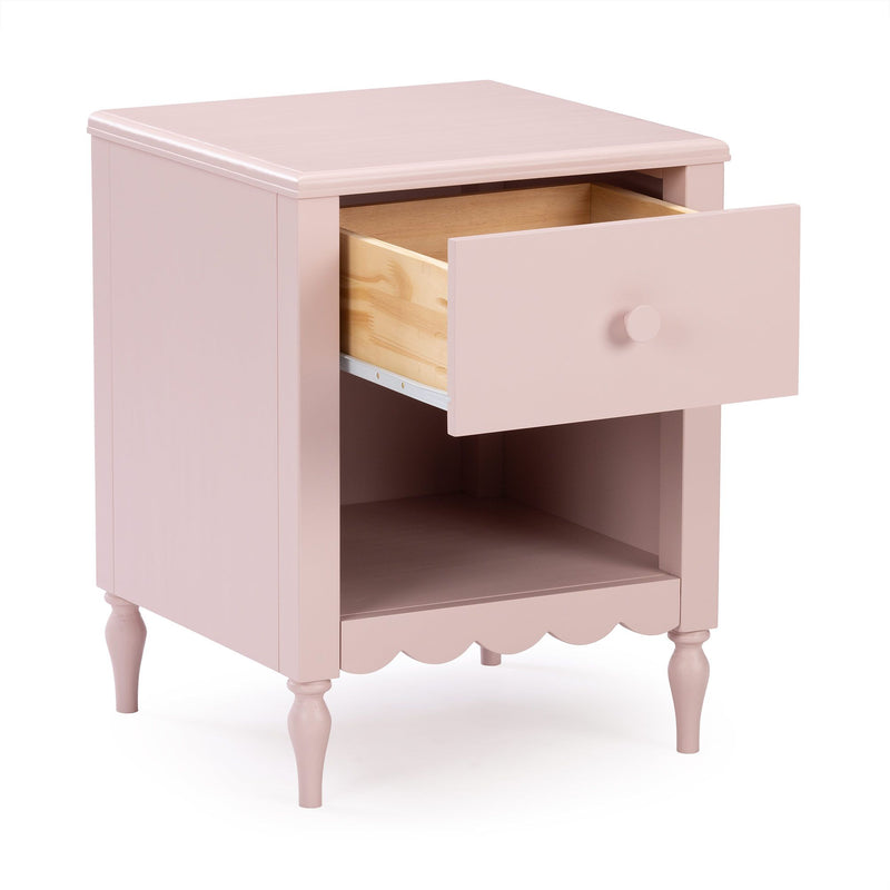 Pink wooden nightstand bedside table with open drawer, lower shelf, turned legs and scalloped apron