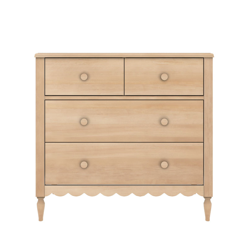 Light wood five-drawer dresser with round wooden knobs, scalloped apron and turned legs in natural maple finish on white background