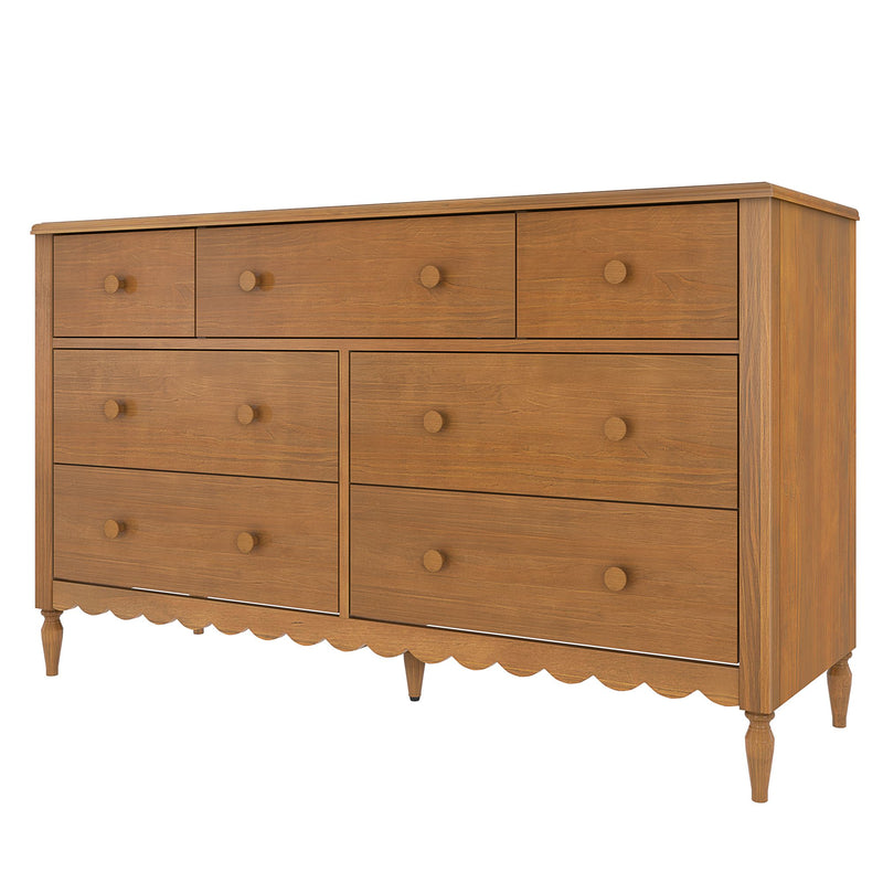 Mid-century style wooden dresser with multiple drawers, round wood knobs, scalloped apron and turned legs in natural oak finish for bedroom storage
