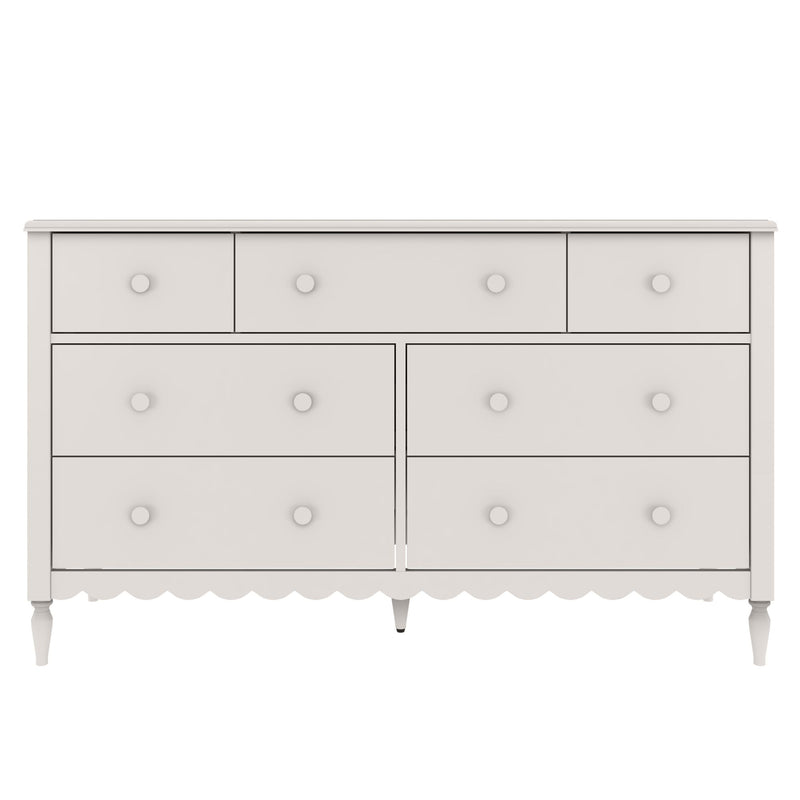 White wooden six-drawer dresser with round knobs, scalloped skirt and turned legs — shabby-chic bedroom storage furniture isolated on white background
