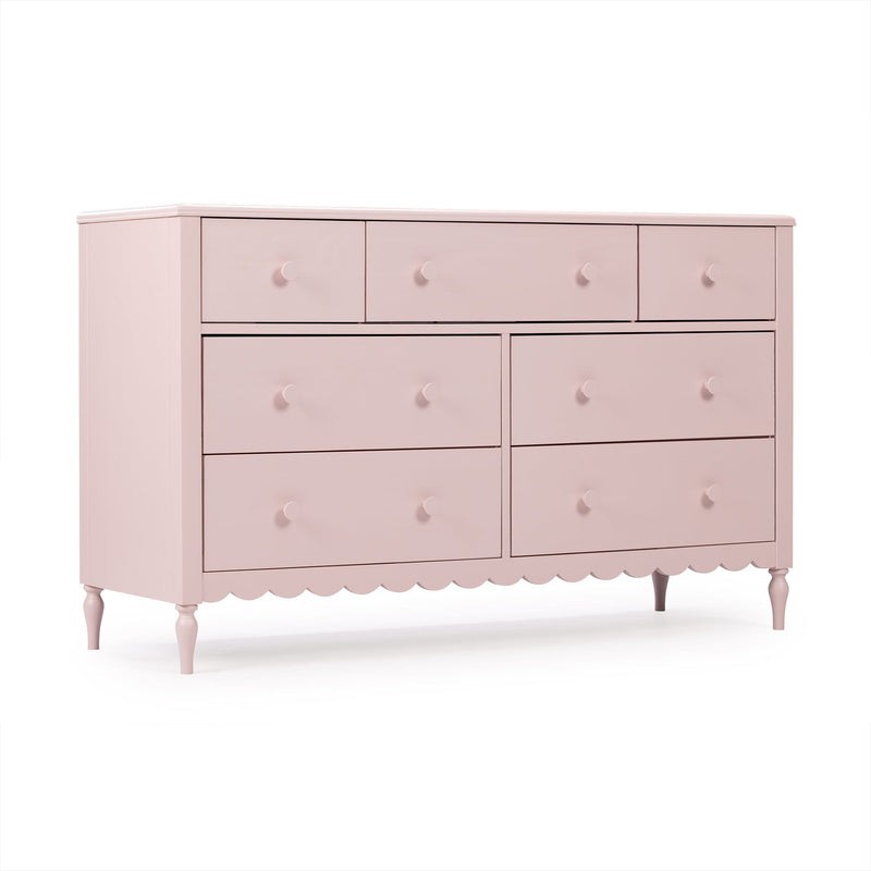 Blush pink wooden dresser chest of drawers with round knobs, scalloped skirt and turned legs – vintage-style nursery or bedroom furniture