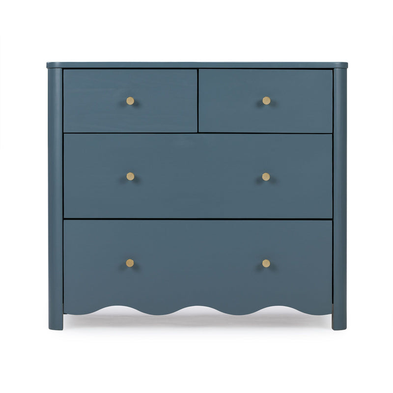 Blue painted wooden four-drawer dresser with round brass knobs and scalloped base, front view on white background